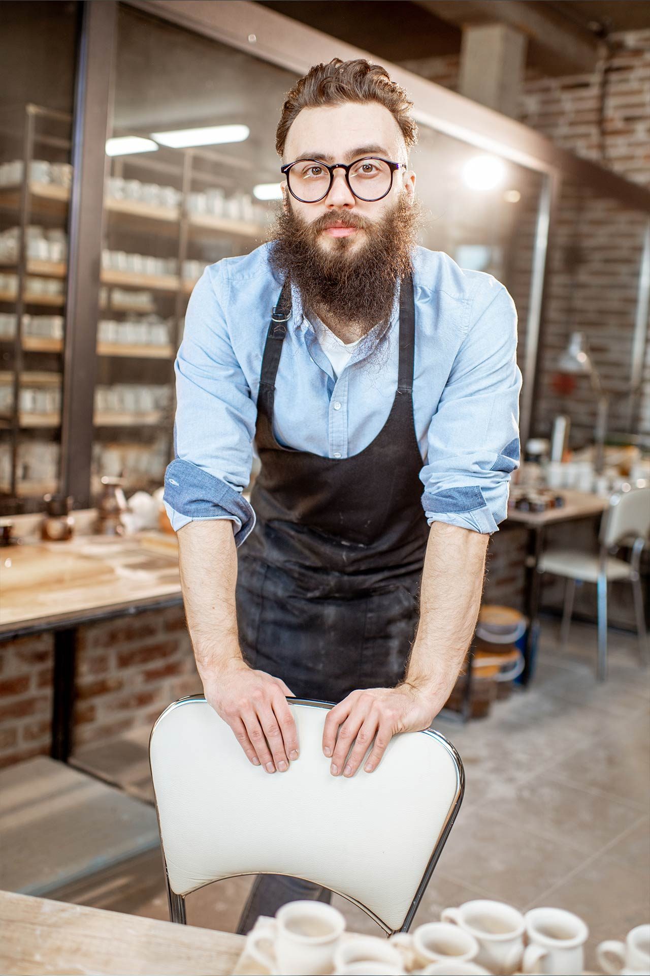 portrait-of-a-man-in-the-pottery-shop-2022-02-07-07-48-44-utc.jpg